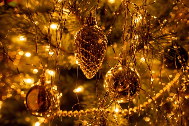 painting and decorating wooden ornaments with warm natural colors in workshop