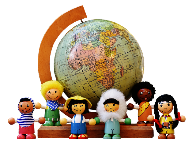 hands cutting and shaping natural wood for safe wooden toy making in workshop